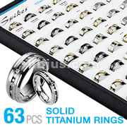 63 Pcs of Assorted Titanium Ring Package with Graphic Inserted Display Board Panel